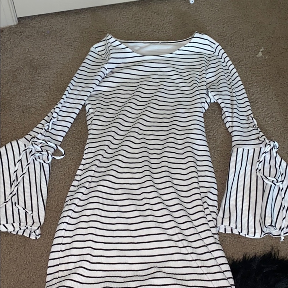 Body con dress. Black stripes